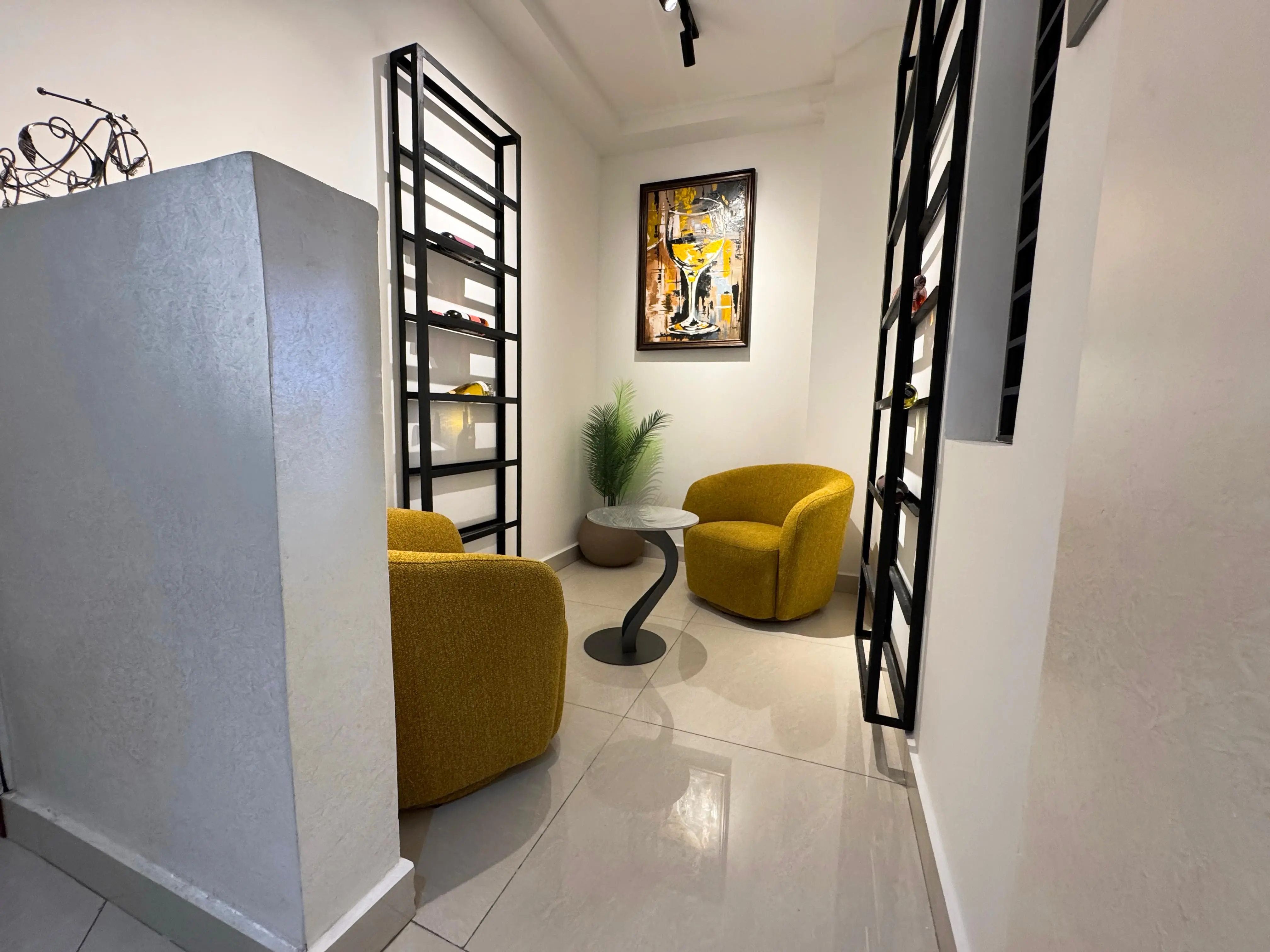 Cozy lounge corner with mustard accent chairs